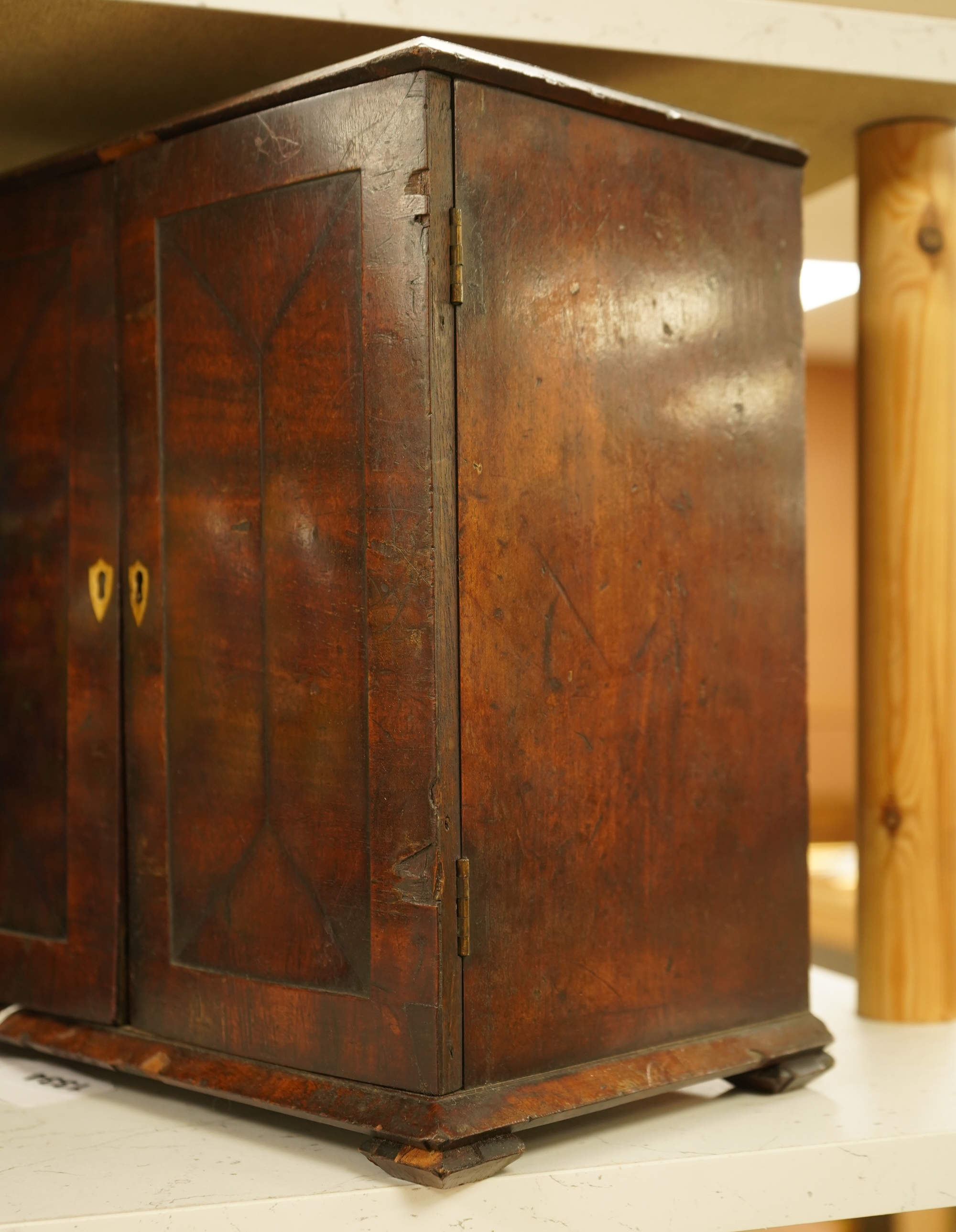 A late 19th century mahogany cabinet fitted with four drawers, 32cm high